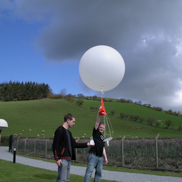 Researchers releasing a weather balloon